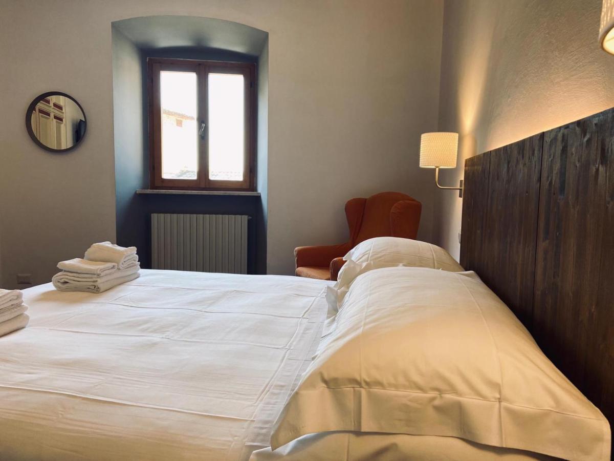 Hotel La Fortezza Assise Extérieur photo