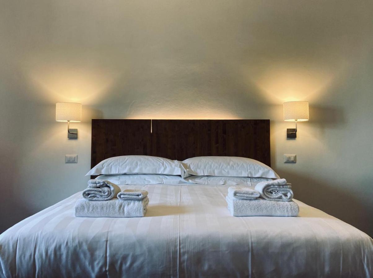 Hotel La Fortezza Assise Extérieur photo