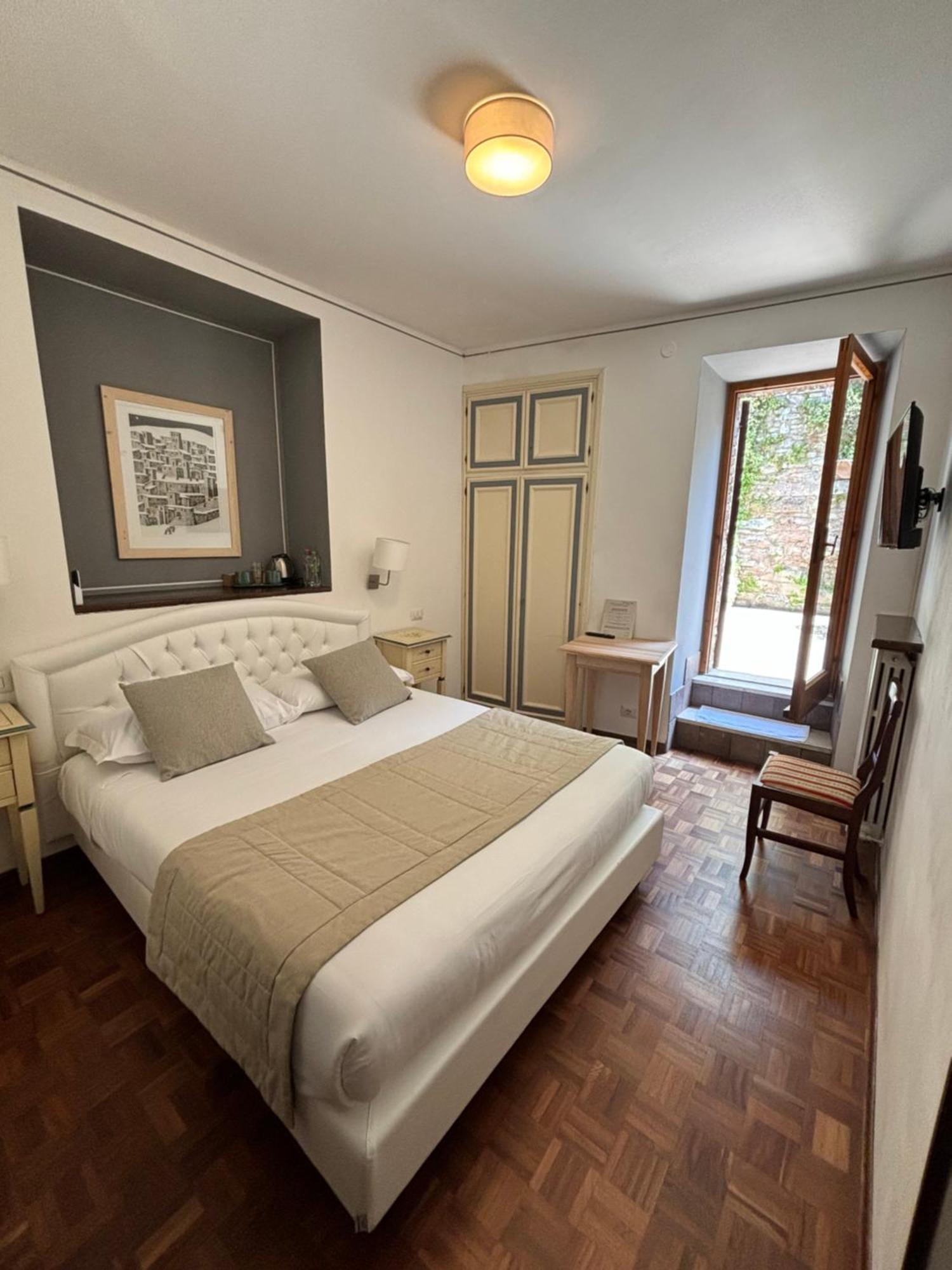 Hotel La Fortezza Assise Extérieur photo